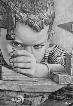 Boy doing wood working