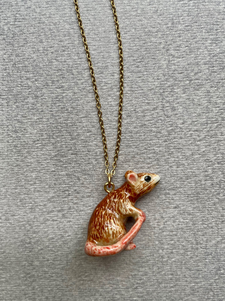 Cartier gold rat pendant sale